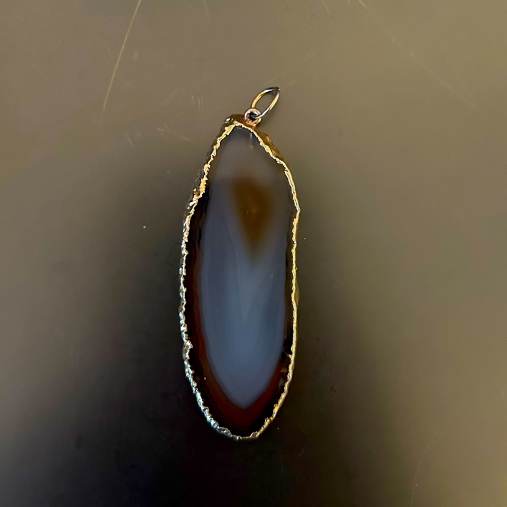 Crystal and gold pendant